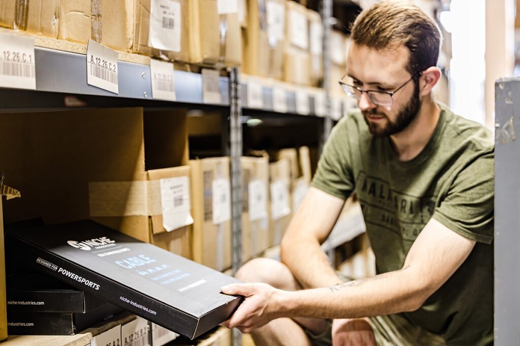 BW Retail warehouse employee completing a pick pack ship process 